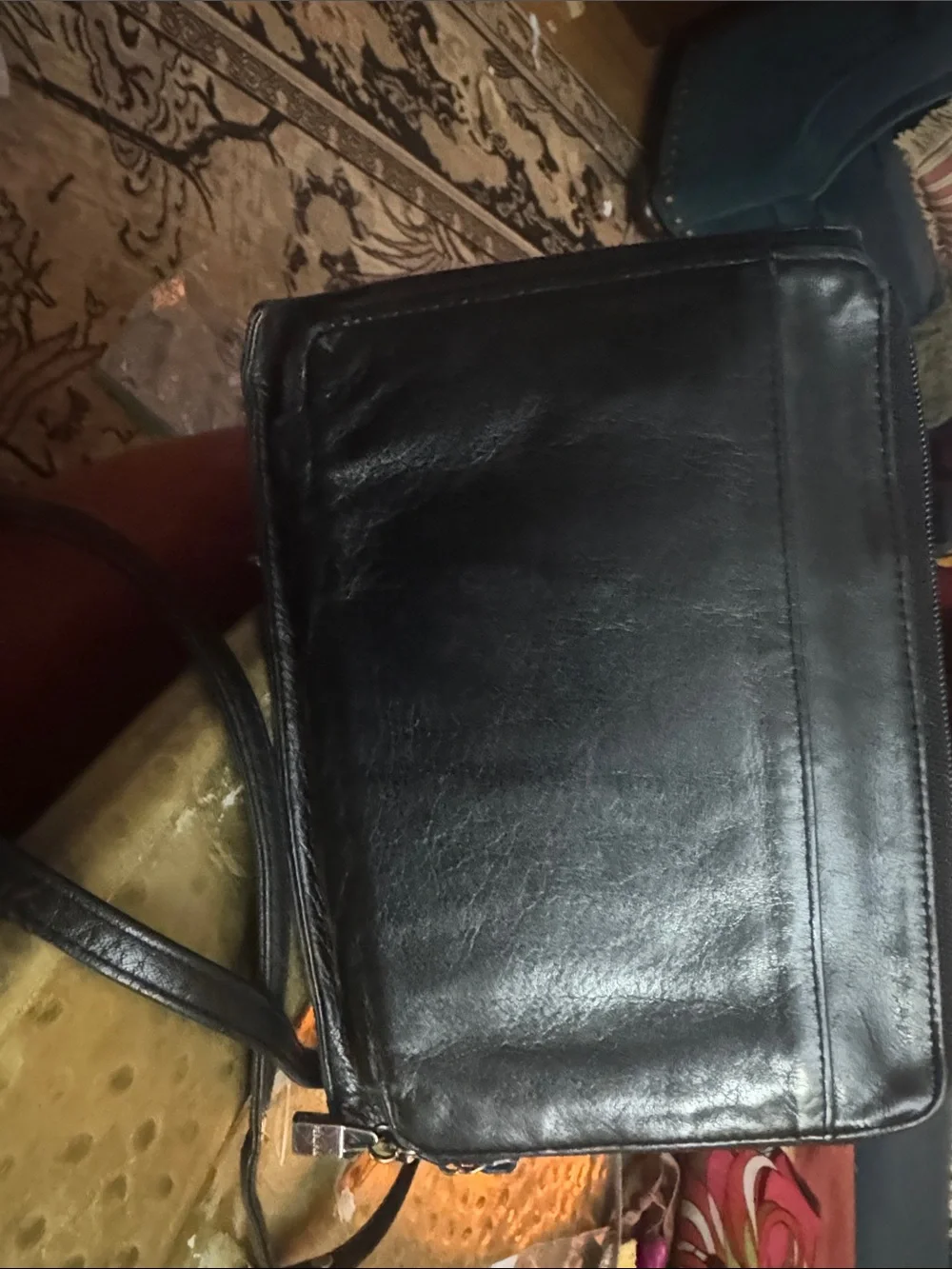 Perlina Black Leather Fold-Over Crossbody with Metal Plaque